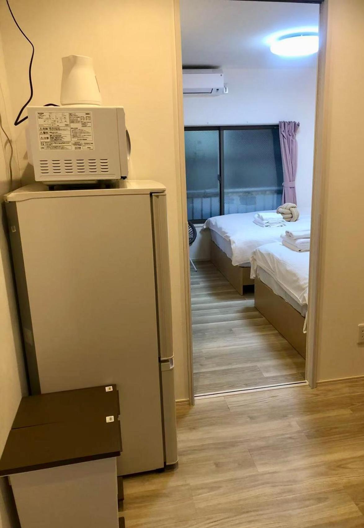 Kosumosu Hotel Tokio Buitenkant foto